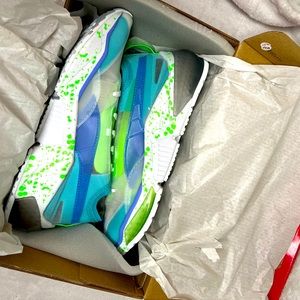 Neon green, blue and white womens pumas size 7